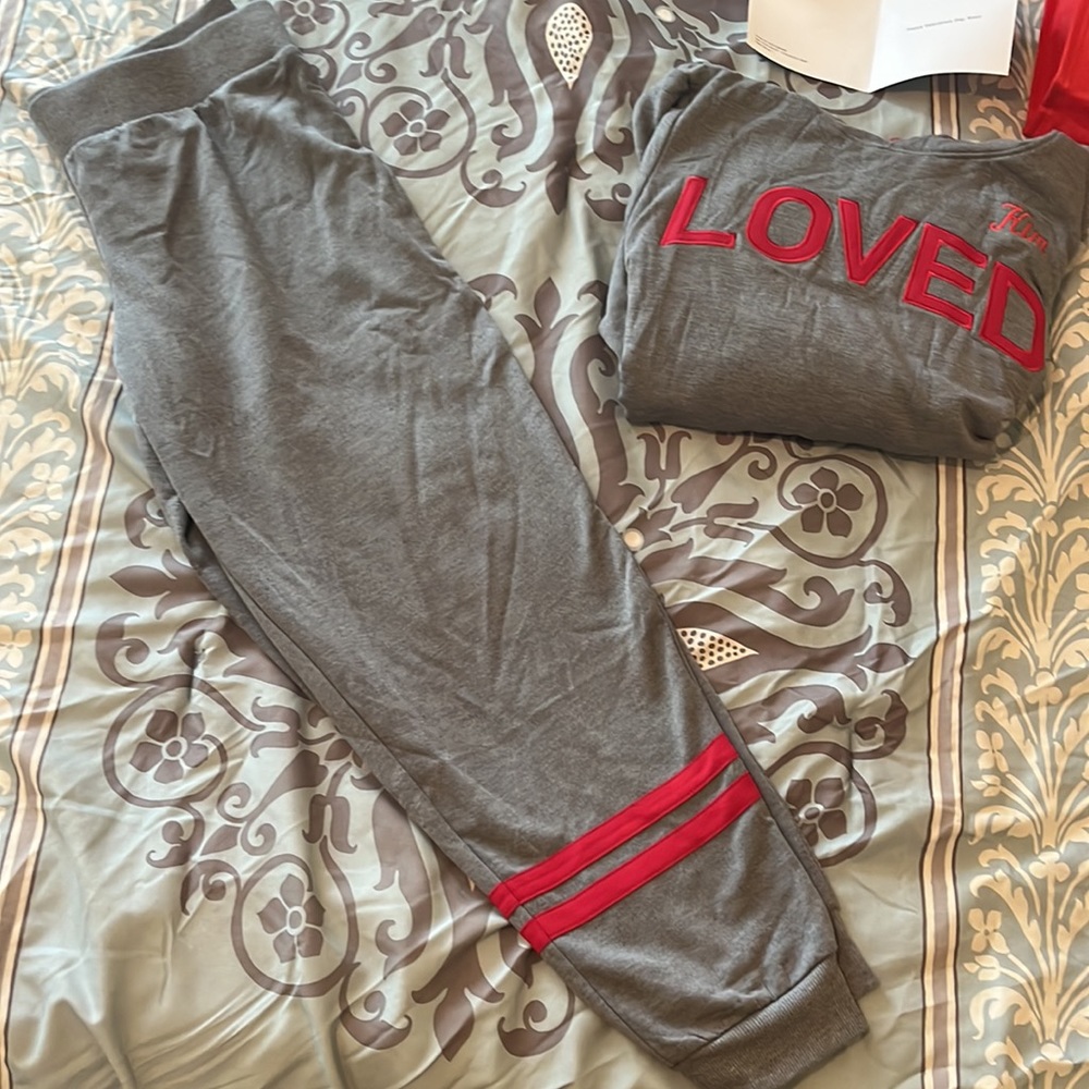 Pajamagram Loved personalized with “Kim” embroidery